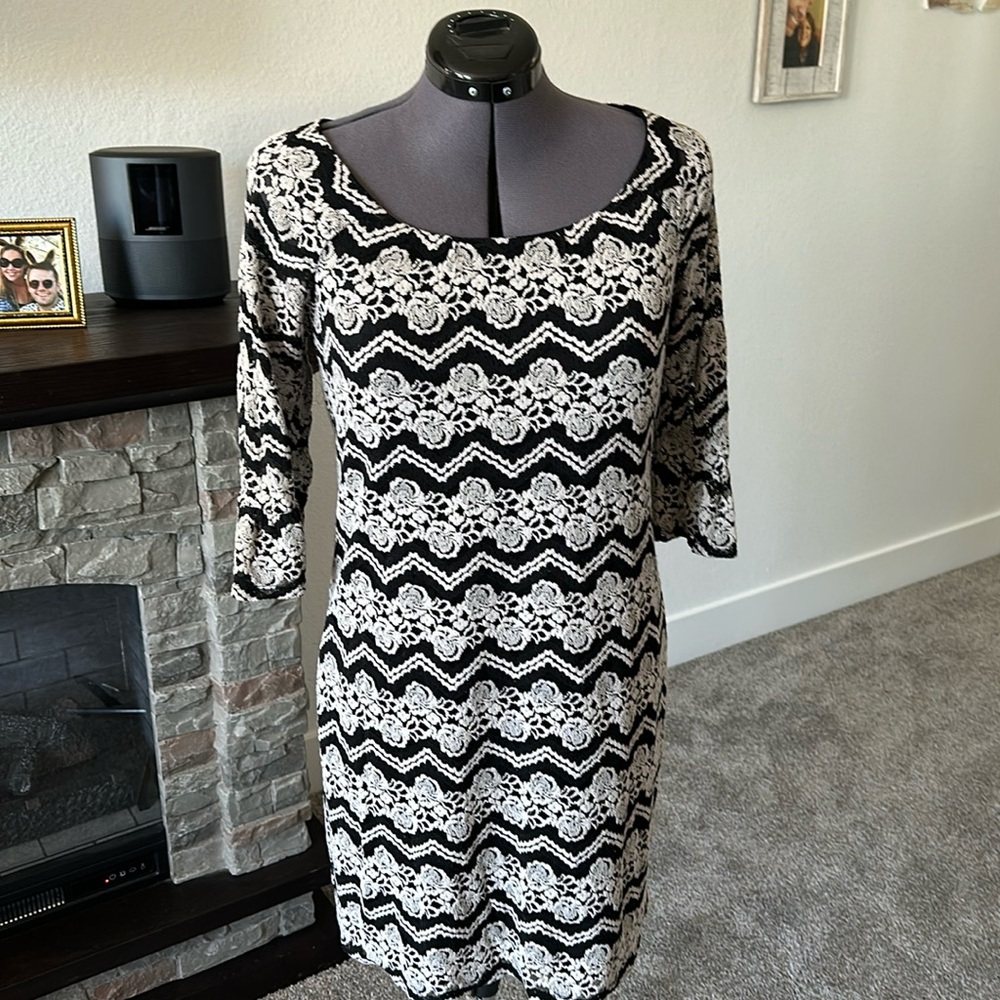 Women’s lined black dress with gray overlay